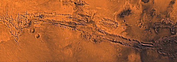 Valles Marineris in mosaic of Viking orbiter images, with Noctis Labyrinthus at the left, Melas Chasma in the middle, Hebes Chasma just left of top ce