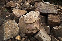 Mined pietra serena rock at a quarry in Vellano Vellano, cava nardini, massi di pietra serena cavati 06.jpg