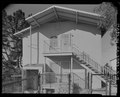 View of east elevation of Building No. 31, seen from rear of Building No. 32. Note roof detail. Looking west - Easter Hill Village, Building No. 31, South side of Corto Square, HABS CA-2783-X-5.tif