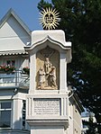 Wayside shrine, white cross