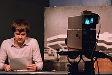 Student presenter broadcasts on YSTV, October 1985. YSTV newsreader 1985.jpg