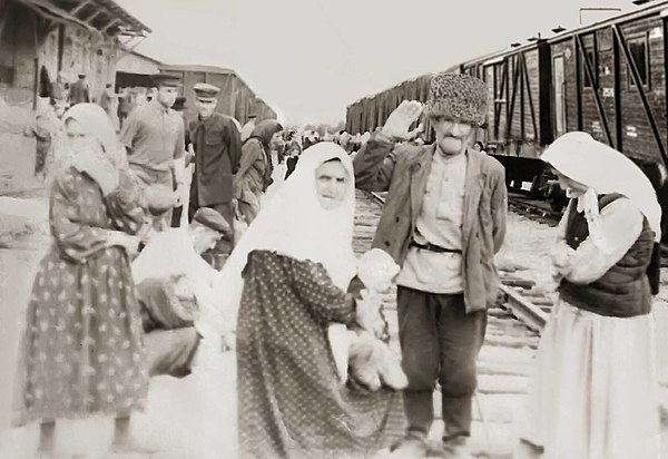 Chechen residents of the village of Yurt-Auh, awaiting return to their homes at a railway station in Bishkek, 1957