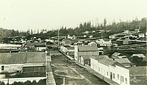 1st Ave looking north from Main St, Seattle, 1865 (CURTIS 2071).jpg