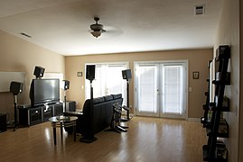 Another fairly typical home theater in 2009, featuring a "large" screen on a rear-projection HD television.