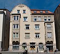 Apartment building with shop (pharmacy)