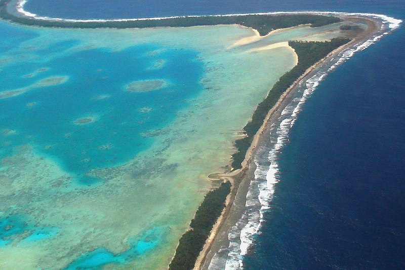 File:Aerial view of Tuvalu’s capital, Funafuti, 2011. Tuvalu is a remote country of low lying atolls, making it vulnerable to climate change. Photo- Lily-Anne Homasi - DFAT (12779656093).jpg