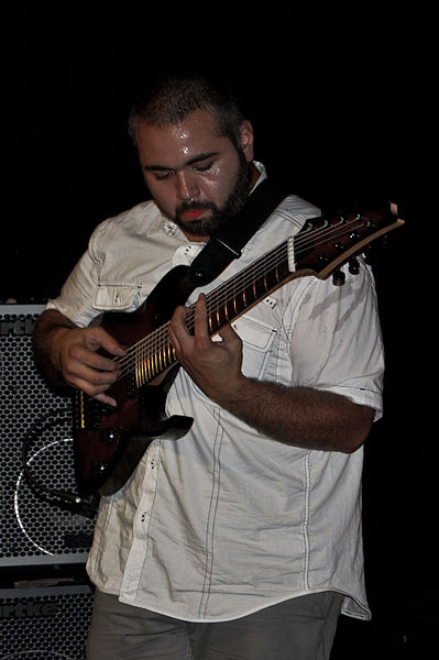 Javier Reyes playing guitar