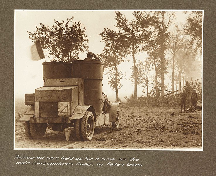 File:Armoured car held up for a time on the main Harbonnieres Road by fallen trees (3007981410).jpg
