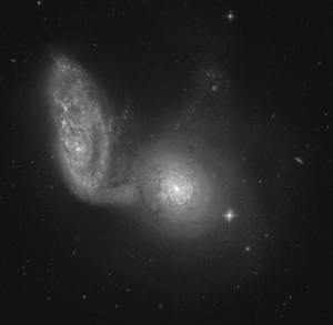 The pair of galaxies Arp 91, consisting of NGC 5953 (center) and NGC 5954, recorded with the Hubble Space Telescope