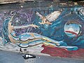 Atomic Girl, grafiti mural de Jonathan Morillas en el barrio de Lagunillas, 2023-05-20.