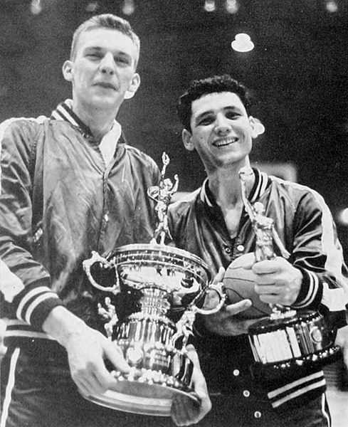 Co-captains Bernie Janicki and Rudy D'Emilio hold Duke's 1953 Dixie Classic trophy.