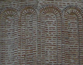 Biserica mănăstirii, decorațiuni exterioare - registrul superior