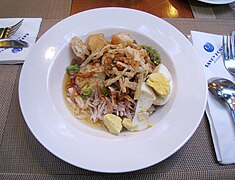 Bubur ayam served for breakfast in the Savoy Homann Hotel, Bandung.