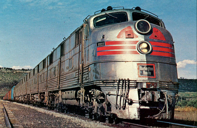 Postcard photo of a Burlington EMD E5 locomotive pulling a freight train in Colorado in 1967