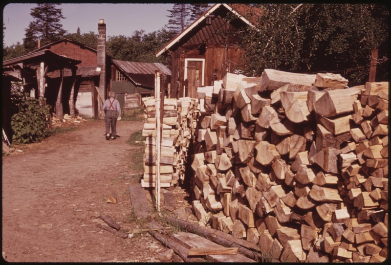 File:CULL LOGS STACKED FOR SALE AT BIG MOOSE - NARA - 554413.tif