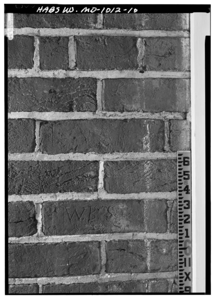 File:DETAIL OF WALL NEAR DOORWAY ON NORTH (FRONT), SHOWING INITIALS INSCRIBED IN THE BRICK, WITH SCALE - Pleasant Hills, 7001 Croom Station Road, Upper Marlboro, Prince George's HABS MD,17-MARBU,11-10.tif