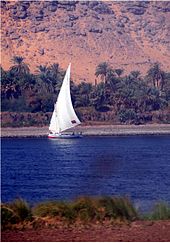 A felucca traversing the Nile near Aswan Dhows on the Nile.jpg