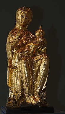 Die Statue wird im Textabschnitt Beschreibung der Skulptur beschrieben.