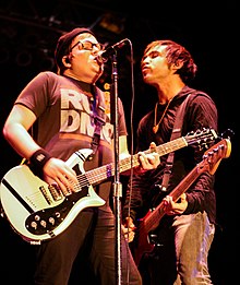Many of the band's melodies are created by Stump (left), while lyricism is handled by Wentz (right).