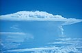 Cumulonimbus velum (around top of the cloud, not be confused with the Incus supplementary feature)