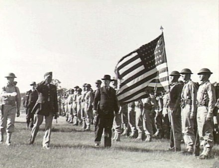 Recently arrived troops of the 41st Infantry Division are reviewed by Australian Army Minister Frank Forde on 14 April 1942, accompanied by Major Gene