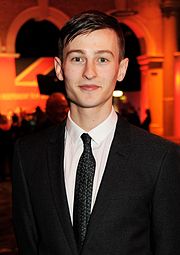 English actor Elliott Tittensor (pictured in 2015) played a young man dating British actress Antonia Thomas in "Charlie Brown" in 2012. Gallery showbiz-elliott-tittensor.jpg