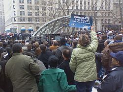 Crowds at Bowling Green Station to witness the ticker-tape parade for the Super Bowl champion New York Giants, February 2008 Gianttickertape.jpg