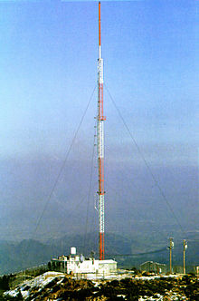 A guyed radio mast Guywire.jpg