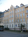 Apartment building in closed development with front garden