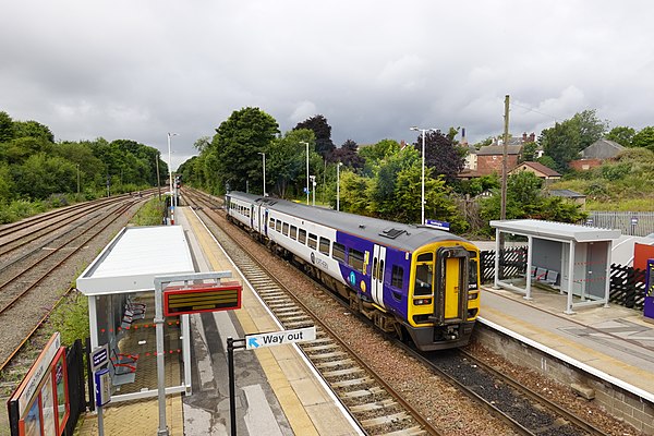 A Northern Class 158 DMU no.158796 calls Knottingley station in August 2021