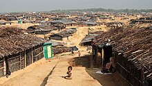 Refugee camp for Rohingya in Bangladesh. The denaturalization of the Rohingya by Myanmar and their later expulsion caused them to become refugees. Kutupalong Refugee Camp (John Owens-VOA).jpg