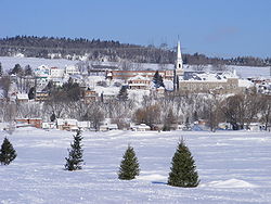 L'Ange-Gardien in winter as seen from the frozen Saint Lawrence River.