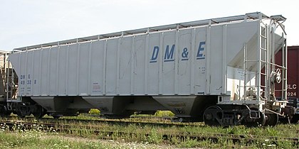 DME 49328, a covered hopper owned and operated by the Dakota, Minnesota and Eastern Railroad