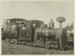 Locomotief genaamd Theo, gebouwd door Orenstein & Koppel, vermoedelijk bij de suikerfabriek Tjoekir ten zuiden van Djombang, KITLV 27497.tiff