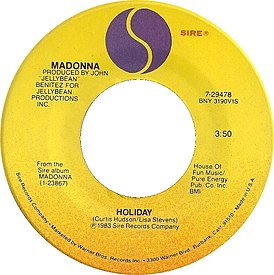 Обложка сингла Мадонны «Holiday» (1983)