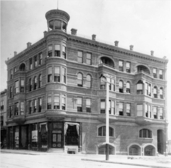 Main Street Savings Bank Building in the 1890s. NE corner of Winston. Demolished.