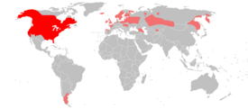 Minkin levinneisyys, alkuperäinen alue tummanpunaisella ja siirtolaisalueet vaaleanpunaisella