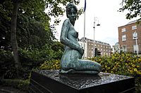 Bronze figure of a pregnant naked woman by Danny Osborne, Merrion Square, Dublin, Ireland