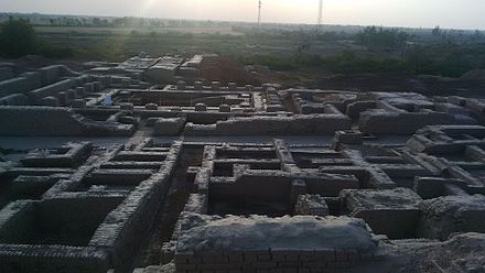 Regularity of streets and buildings suggests the influence of ancient urban planning in Mohenjo-daro's construction.