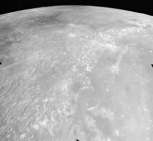 Oblique view of the southern Montes Apenninus facing south from 115 km altitude, with Eratosthenes in upper right (Apollo 15) Montes Apenninus AS15-M-2579.jpg