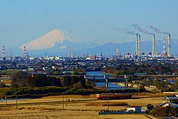 The Keiyō Industrial Zone, one of Japan's largest industrial complexes that spans the eight cities of Chiba Prefecture, and Mount Fuji on the horizon