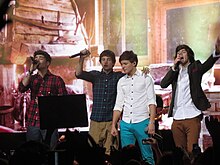 One Direction performing on their Up All Night Tour, January 2012 One Direction Glasgow 3.jpg