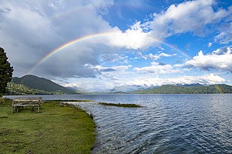Rara Lake looks much beautiful when Rainbow meets with it.