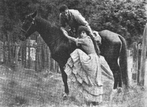 Peters lifts Beatriz Michelena onto his horse in Salomy Jane (1914)