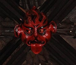 The face of the devil in the nave roof