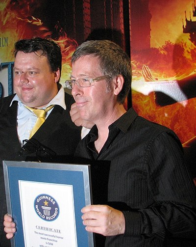 The Saw series was placed in the Guinness World Records as the "Most Successful Horror Franchise". Pictured here is director Kevin Greutert receiving 