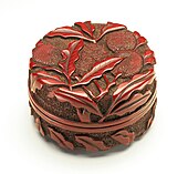 A Ming dynasty red "seal paste box" in carved lacquer Seal Paste Box (Yinnihe) with Litchi Stems LACMA M.87.205a-b (1 of 2).jpg