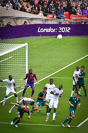 The Senegalese Olympic Football Team defend a cross against Mexico, in a quarter final at the 2012 London Olympics
