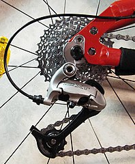 A set of rear sprockets (also known as a cassette) and a derailleur