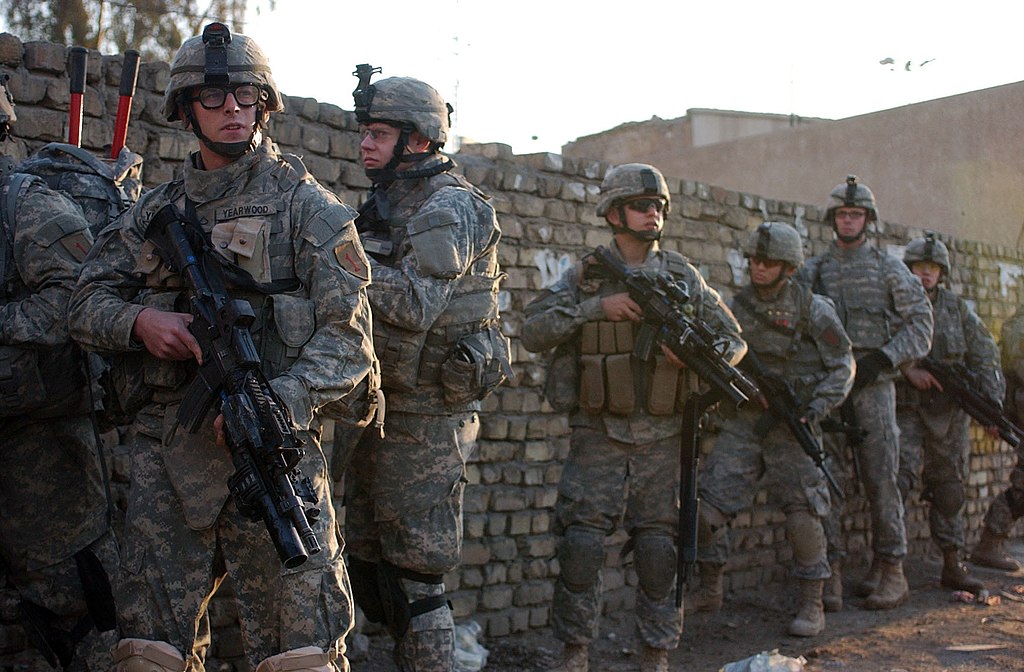 Soldiers from C Company, 1st Battalion, 26th Infantry Regiment, 2nd Brigade Combat Team, 1st Infantry Division, perform a Cordon and Search operation in Al Adhamiya, Baghdad, Iraq, Feb. 21, 2007